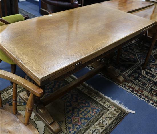 An oak draw leaf table, W.137cm